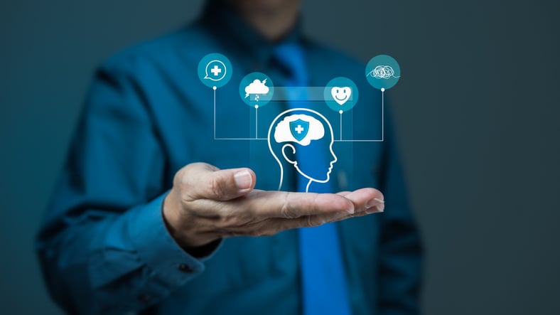 Businessman Presenting Mental Health Support and Cognitive Wellness Solutions