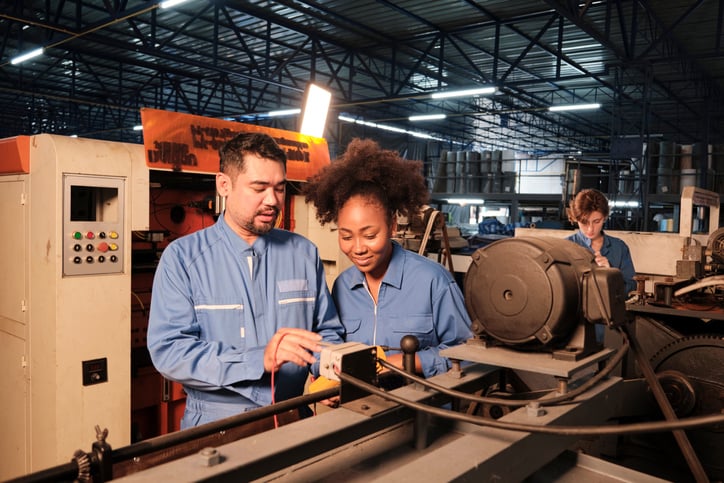 Manufacturing employees accessing virtual care through First Stop Health to improve healthcare access across a multi-state workforce.