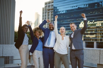 group of employees cheering 