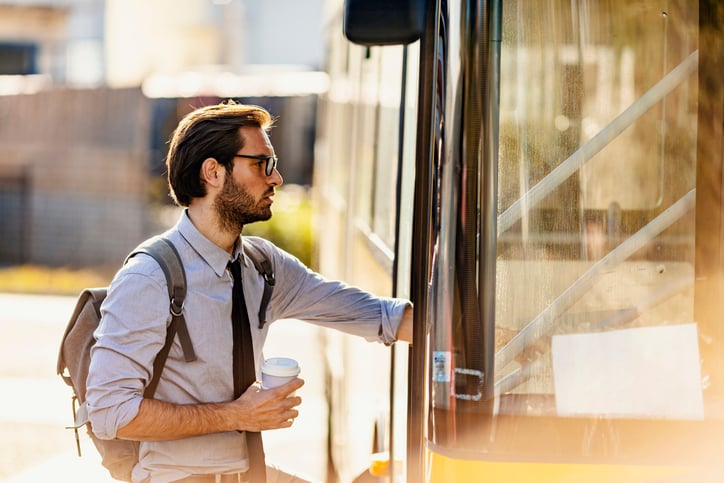 employee catching bus to work - virtual care 