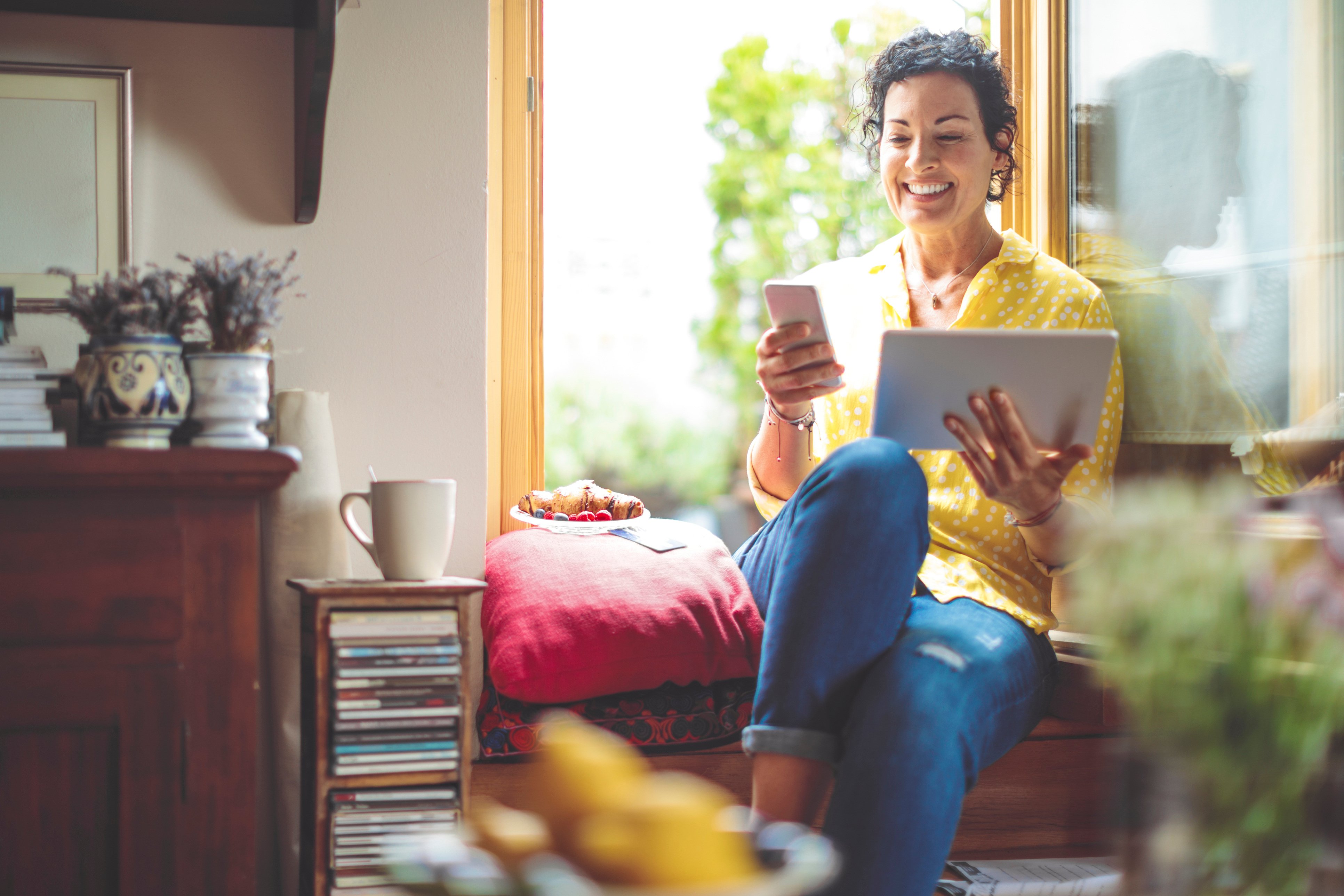 Person Smiling at Phone