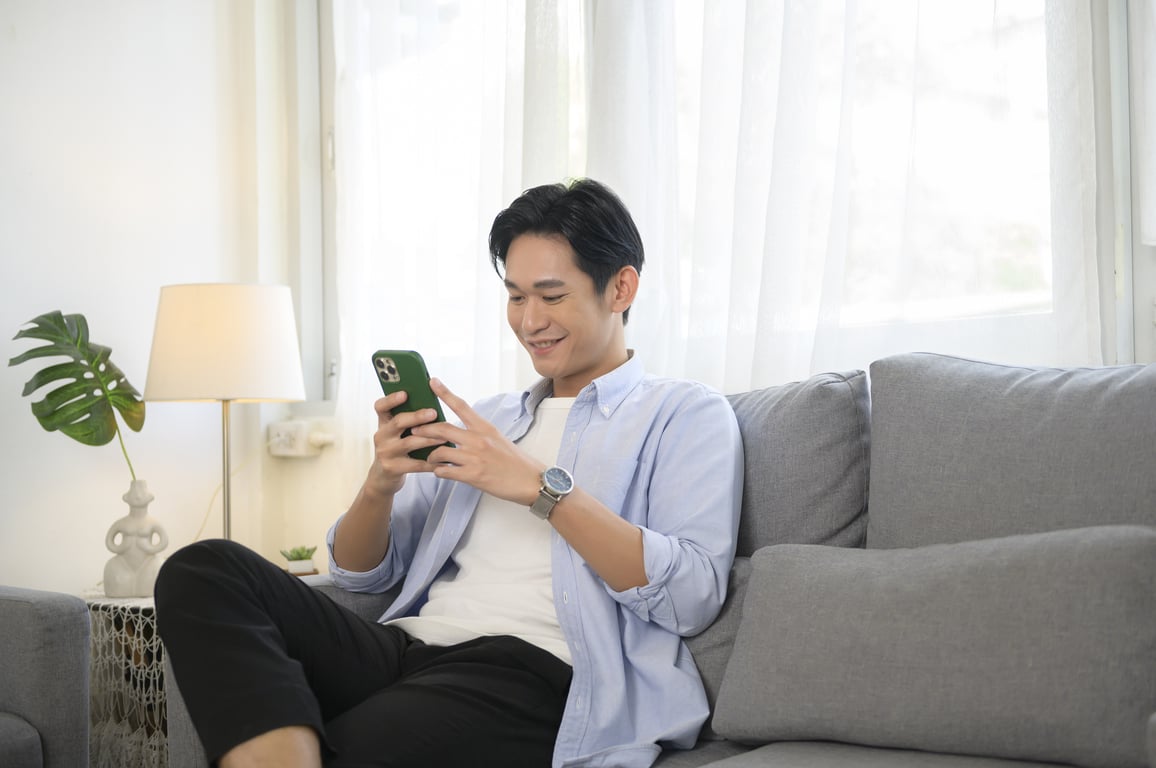 man using video chat on smart phone