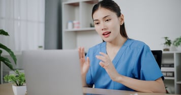 young virtual care provider talking to patient 