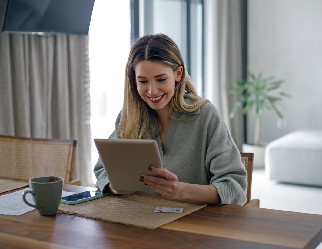 woman looking at laptop